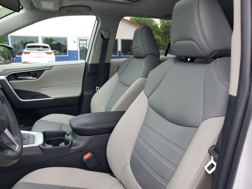 2021 Blizzard Pearl /Ash Toyota RAV4 Hybrid XLE AWD (2T3B6RFV5MW) with an 2.5L L4 DOHC 16V HYBRID engine, CVT transmission, located at 6064 Gull Rd, Kalamazoo, MI, 49048, (269) 222-0088, 42.328388, -85.512924 - Discover the perfect blend of reliability and style with this 2021 Toyota RAV4 XLE Premium, now available with AWD for enhanced performance. This versatile SUV is powered by a robust 4-cylinder, 2.5L engine, ensuring a smooth and efficient driving experience.<br><br>This Toyota RAV4 comes with a CAR - Photo#13