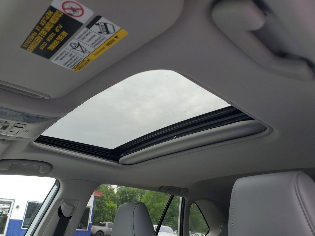 2021 Blizzard Pearl /Ash Toyota RAV4 Hybrid XLE AWD (2T3B6RFV5MW) with an 2.5L L4 DOHC 16V HYBRID engine, CVT transmission, located at 6064 Gull Rd, Kalamazoo, MI, 49048, (269) 222-0088, 42.328388, -85.512924 - Discover the perfect blend of reliability and style with this 2021 Toyota RAV4 XLE Premium, now available with AWD for enhanced performance. This versatile SUV is powered by a robust 4-cylinder, 2.5L engine, ensuring a smooth and efficient driving experience.<br><br>This Toyota RAV4 comes with a CAR - Photo#16