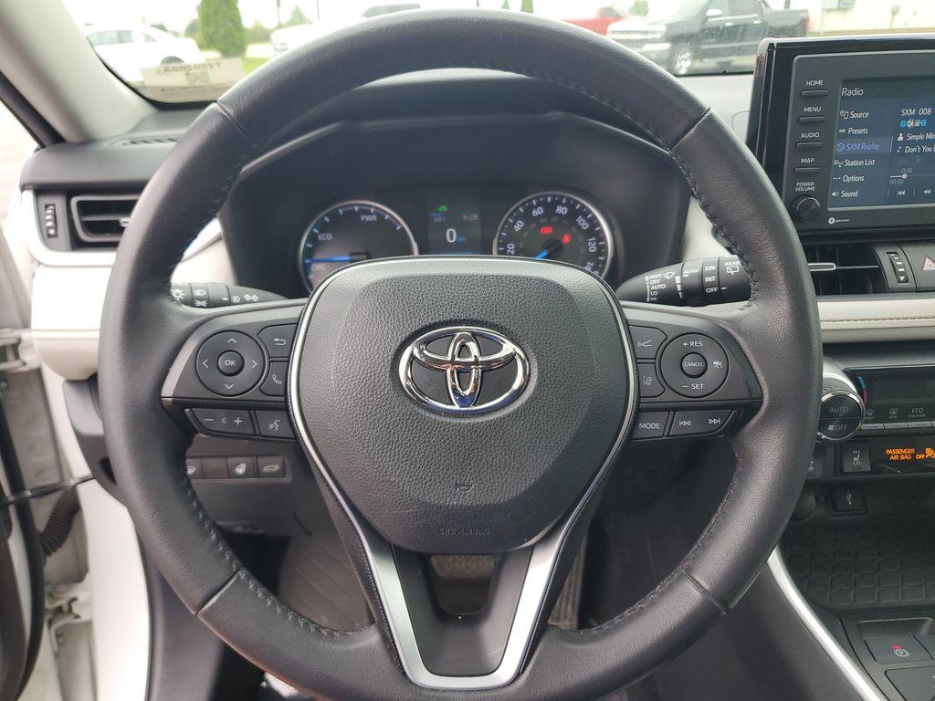 2021 Blizzard Pearl /Ash Toyota RAV4 Hybrid XLE AWD (2T3B6RFV5MW) with an 2.5L L4 DOHC 16V HYBRID engine, CVT transmission, located at 6064 Gull Rd, Kalamazoo, MI, 49048, (269) 222-0088, 42.328388, -85.512924 - Discover the perfect blend of reliability and style with this 2021 Toyota RAV4 XLE Premium, now available with AWD for enhanced performance. This versatile SUV is powered by a robust 4-cylinder, 2.5L engine, ensuring a smooth and efficient driving experience.<br><br>This Toyota RAV4 comes with a CAR - Photo#17
