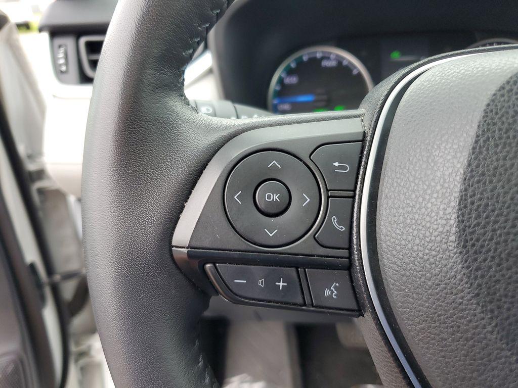2021 Blizzard Pearl /Ash Toyota RAV4 Hybrid XLE AWD (2T3B6RFV5MW) with an 2.5L L4 DOHC 16V HYBRID engine, CVT transmission, located at 6064 Gull Rd, Kalamazoo, MI, 49048, (269) 222-0088, 42.328388, -85.512924 - Discover the perfect blend of reliability and style with this 2021 Toyota RAV4 XLE Premium, now available with AWD for enhanced performance. This versatile SUV is powered by a robust 4-cylinder, 2.5L engine, ensuring a smooth and efficient driving experience.<br><br>This Toyota RAV4 comes with a CAR - Photo#18