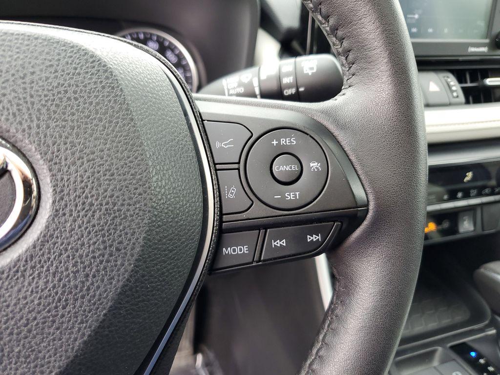 2021 Blizzard Pearl /Ash Toyota RAV4 Hybrid XLE AWD (2T3B6RFV5MW) with an 2.5L L4 DOHC 16V HYBRID engine, CVT transmission, located at 6064 Gull Rd, Kalamazoo, MI, 49048, (269) 222-0088, 42.328388, -85.512924 - Discover the perfect blend of reliability and style with this 2021 Toyota RAV4 XLE Premium, now available with AWD for enhanced performance. This versatile SUV is powered by a robust 4-cylinder, 2.5L engine, ensuring a smooth and efficient driving experience.<br><br>This Toyota RAV4 comes with a CAR - Photo#19