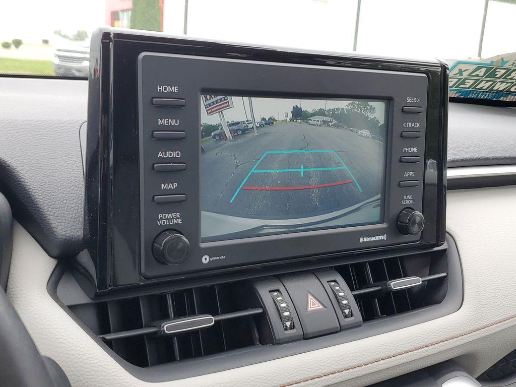 2021 Blizzard Pearl /Ash Toyota RAV4 Hybrid XLE AWD (2T3B6RFV5MW) with an 2.5L L4 DOHC 16V HYBRID engine, CVT transmission, located at 6064 Gull Rd, Kalamazoo, MI, 49048, (269) 222-0088, 42.328388, -85.512924 - Discover the perfect blend of reliability and style with this 2021 Toyota RAV4 XLE Premium, now available with AWD for enhanced performance. This versatile SUV is powered by a robust 4-cylinder, 2.5L engine, ensuring a smooth and efficient driving experience.<br><br>This Toyota RAV4 comes with a CAR - Photo#22