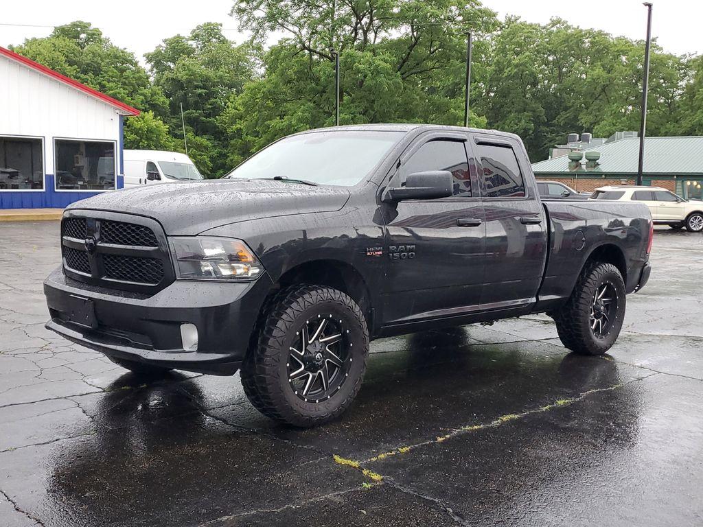 2017 BLACK /GREY RAM 1500 Tradesman Quad Cab 4WD (1C6RR7FT0HS) with an 5.7L V8 OHV 16V engine, 8A transmission, located at 6064 Gull Rd, Kalamazoo, MI, 49048, (269) 222-0088, 42.328388, -85.512924 - Discover power and capability with this 2017 Ram 1500, now available at our dealership. Equipped with a robust 5.7L V8 engine and 4WD, this truck is built to handle any challenge, whether you're navigating rugged terrain or cruising on the highway. With its impressive towing capacity and reliable pe - Photo#1