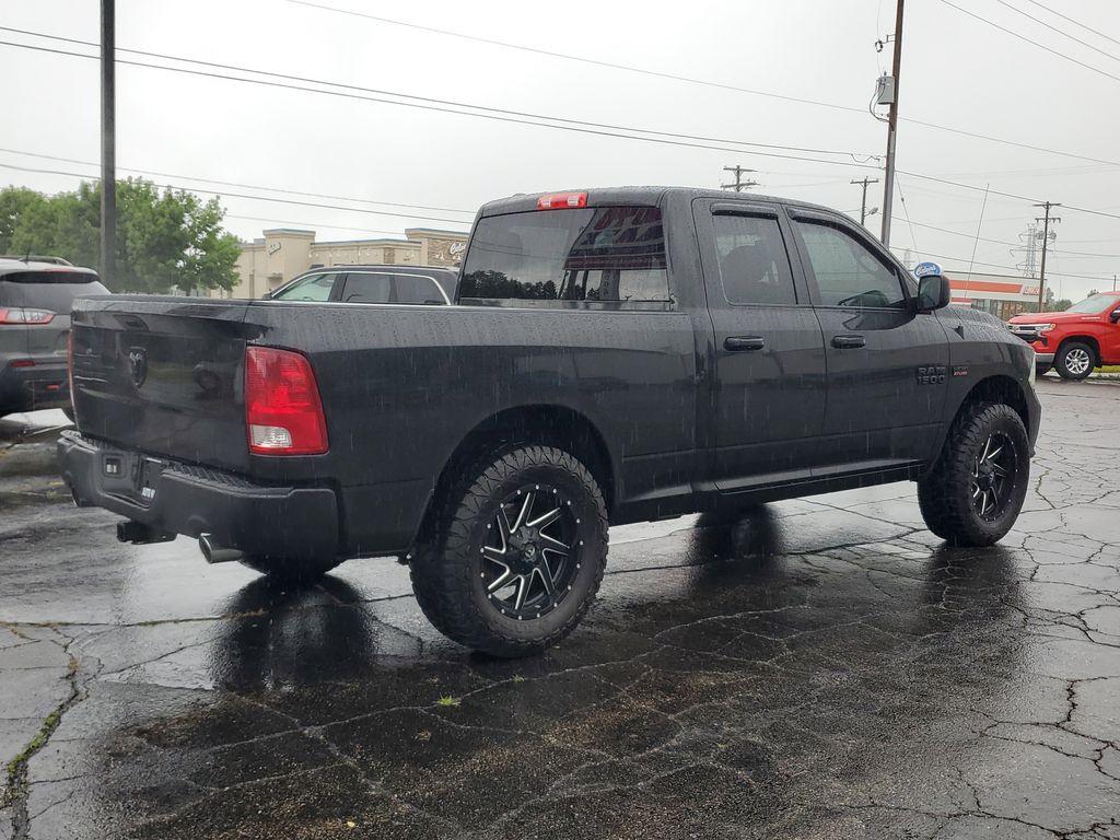 2017 BLACK /GREY RAM 1500 Tradesman Quad Cab 4WD (1C6RR7FT0HS) with an 5.7L V8 OHV 16V engine, 8A transmission, located at 6064 Gull Rd, Kalamazoo, MI, 49048, (269) 222-0088, 42.328388, -85.512924 - Discover power and capability with this 2017 Ram 1500, now available at our dealership. Equipped with a robust 5.7L V8 engine and 4WD, this truck is built to handle any challenge, whether you're navigating rugged terrain or cruising on the highway. With its impressive towing capacity and reliable pe - Photo#3