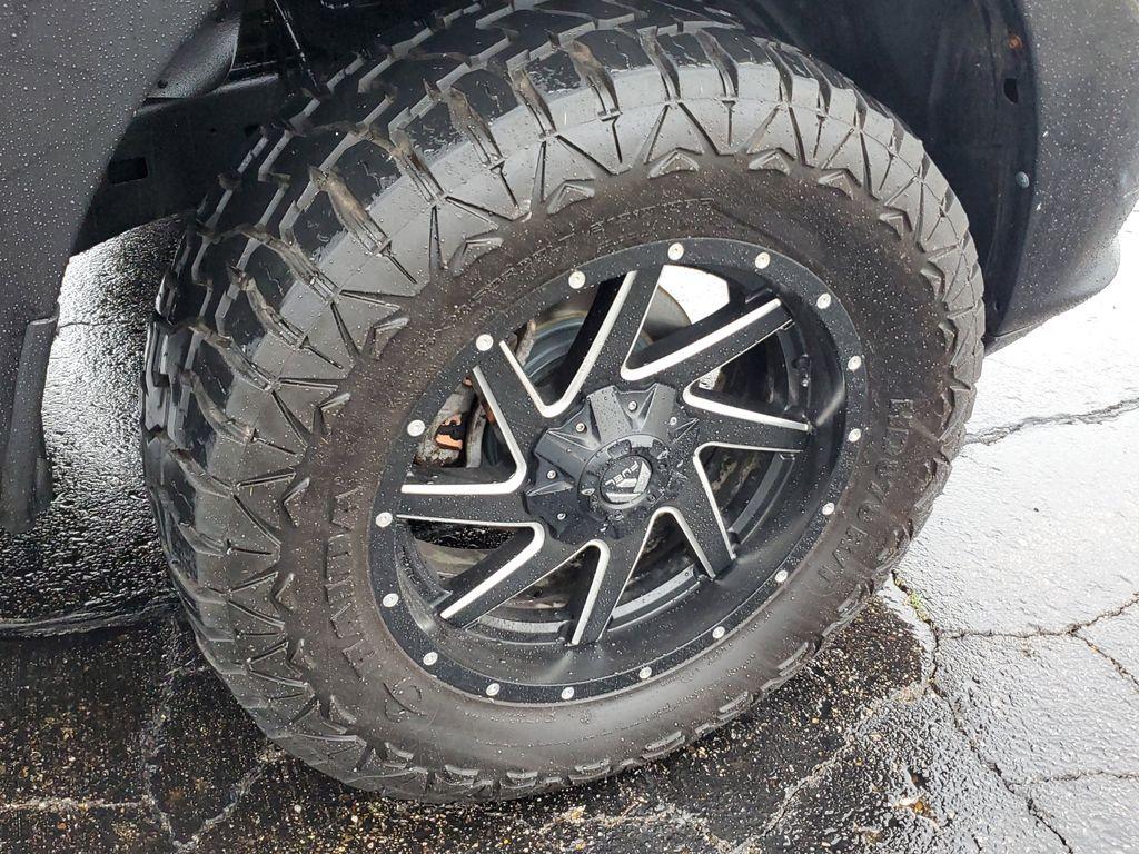 2017 BLACK /GREY RAM 1500 Tradesman Quad Cab 4WD (1C6RR7FT0HS) with an 5.7L V8 OHV 16V engine, 8A transmission, located at 6064 Gull Rd, Kalamazoo, MI, 49048, (269) 222-0088, 42.328388, -85.512924 - Discover power and capability with this 2017 Ram 1500, now available at our dealership. Equipped with a robust 5.7L V8 engine and 4WD, this truck is built to handle any challenge, whether you're navigating rugged terrain or cruising on the highway. With its impressive towing capacity and reliable pe - Photo#4