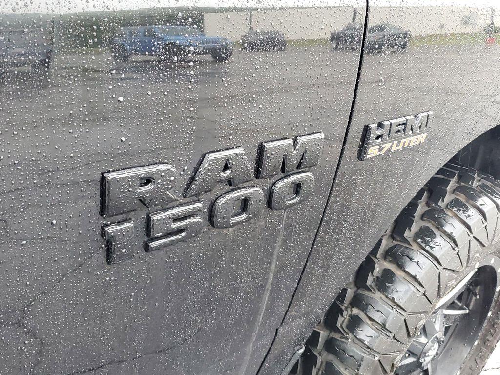 2017 BLACK /GREY RAM 1500 Tradesman Quad Cab 4WD (1C6RR7FT0HS) with an 5.7L V8 OHV 16V engine, 8A transmission, located at 6064 Gull Rd, Kalamazoo, MI, 49048, (269) 222-0088, 42.328388, -85.512924 - Discover power and capability with this 2017 Ram 1500, now available at our dealership. Equipped with a robust 5.7L V8 engine and 4WD, this truck is built to handle any challenge, whether you're navigating rugged terrain or cruising on the highway. With its impressive towing capacity and reliable pe - Photo#5