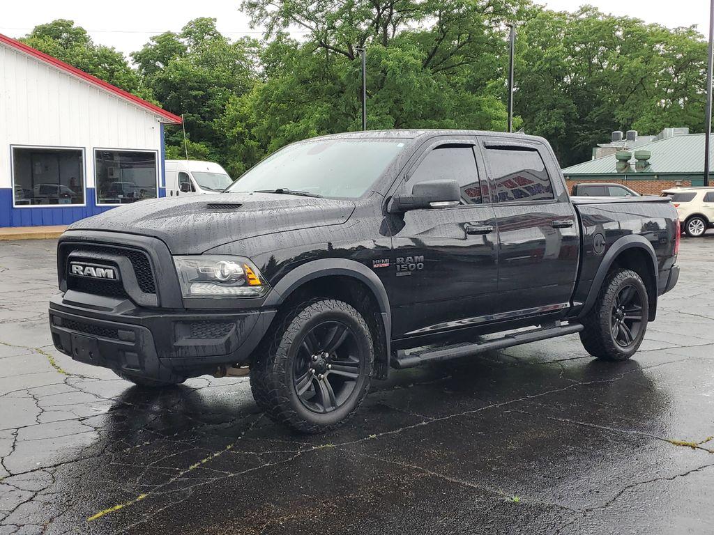 2021 Diamond Black Crystal Pearl /BLACK RAM 1500 Classic Tradesman Crew Cab SWB 4WD (1C6RR7LT3MS) with an 5.7L V8 OHV 16V engine, 8A transmission, located at 6064 Gull Rd, Kalamazoo, MI, 49048, (269) 222-0088, 42.328388, -85.512924 - Discover the robust performance and timeless design of the 2021 Ram 1500 Classic Warlock, a perfect blend of power and sophistication. This formidable pickup is equipped with a 5.7L V8 engine, delivering exceptional strength and capability, while the 4WD system ensures superior traction and stabilit - Photo#1