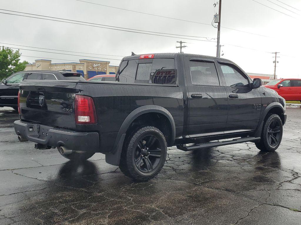 2021 Diamond Black Crystal Pearl /BLACK RAM 1500 Classic Tradesman Crew Cab SWB 4WD (1C6RR7LT3MS) with an 5.7L V8 OHV 16V engine, 8A transmission, located at 6064 Gull Rd, Kalamazoo, MI, 49048, (269) 222-0088, 42.328388, -85.512924 - Discover the robust performance and timeless design of the 2021 Ram 1500 Classic Warlock, a perfect blend of power and sophistication. This formidable pickup is equipped with a 5.7L V8 engine, delivering exceptional strength and capability, while the 4WD system ensures superior traction and stabilit - Photo#3