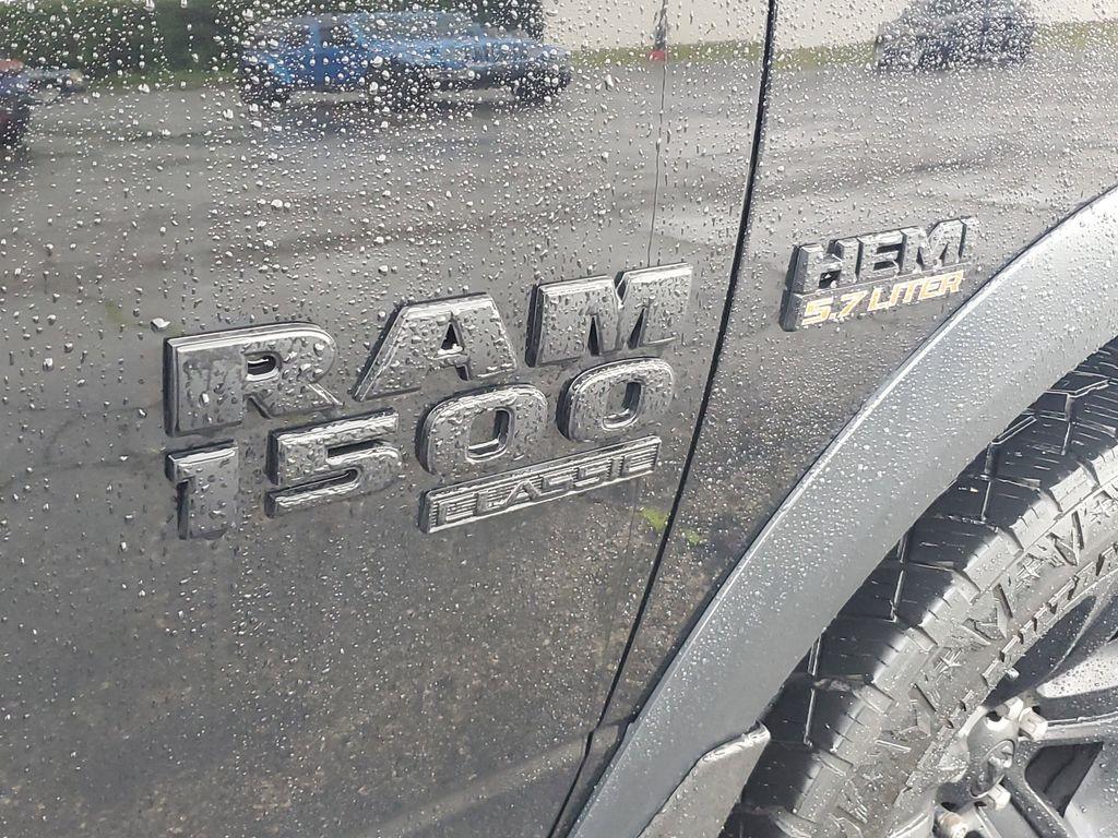 2021 Diamond Black Crystal Pearl /BLACK RAM 1500 Classic Tradesman Crew Cab SWB 4WD (1C6RR7LT3MS) with an 5.7L V8 OHV 16V engine, 8A transmission, located at 6064 Gull Rd, Kalamazoo, MI, 49048, (269) 222-0088, 42.328388, -85.512924 - Discover the robust performance and timeless design of the 2021 Ram 1500 Classic Warlock, a perfect blend of power and sophistication. This formidable pickup is equipped with a 5.7L V8 engine, delivering exceptional strength and capability, while the 4WD system ensures superior traction and stabilit - Photo#5