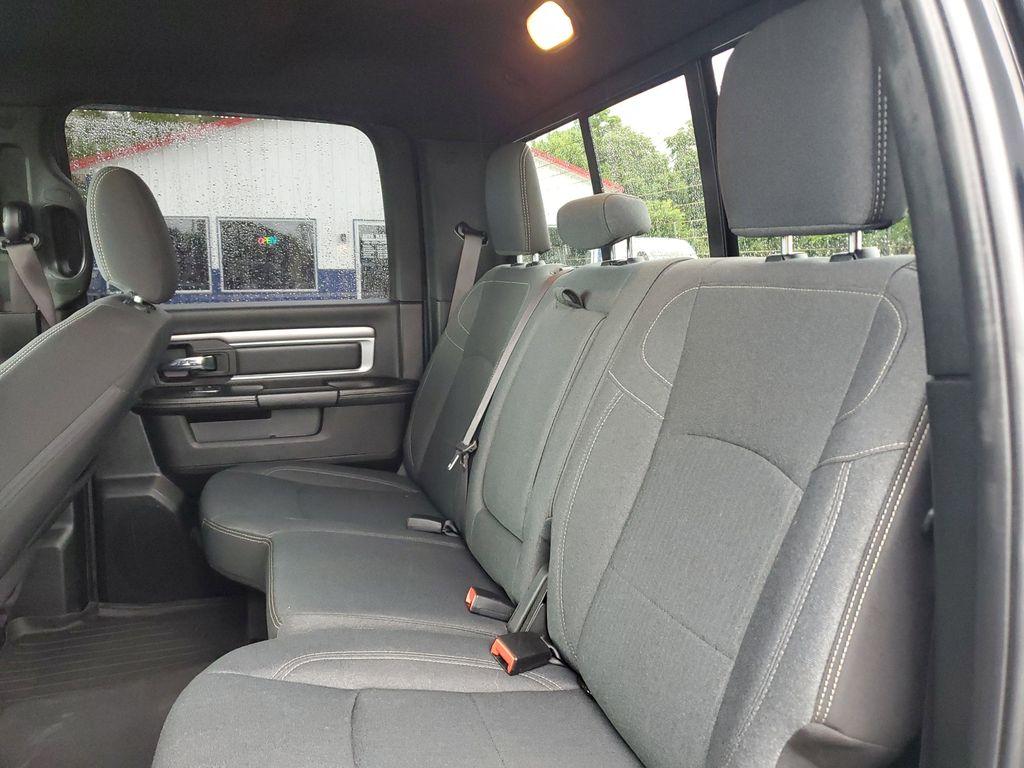 2021 Diamond Black Crystal Pearl /BLACK RAM 1500 Classic Tradesman Crew Cab SWB 4WD (1C6RR7LT3MS) with an 5.7L V8 OHV 16V engine, 8A transmission, located at 6064 Gull Rd, Kalamazoo, MI, 49048, (269) 222-0088, 42.328388, -85.512924 - Discover the robust performance and timeless design of the 2021 Ram 1500 Classic Warlock, a perfect blend of power and sophistication. This formidable pickup is equipped with a 5.7L V8 engine, delivering exceptional strength and capability, while the 4WD system ensures superior traction and stabilit - Photo#7