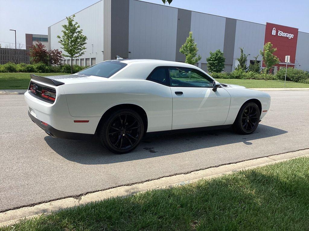 2017 /Black Dodge Challenger SXT (2C3CDZAG6HH) with an 3.6L V6 DOHC 24V engine, 8A transmission, located at 6064 Gull Rd, Kalamazoo, MI, 49048, (269) 222-0088, 42.328388, -85.512924 - <b>Summary</b><br>Power Moonroof<br><br><b>Vehicle Details</b><br>Experience the thrill of driving with this stunning 2017 Dodge Challenger SXT, a true embodiment of power and style. This remarkable vehicle features a robust V6, 3.6L engine paired with rear-wheel drive, offering an exhilarating yet - Photo#6