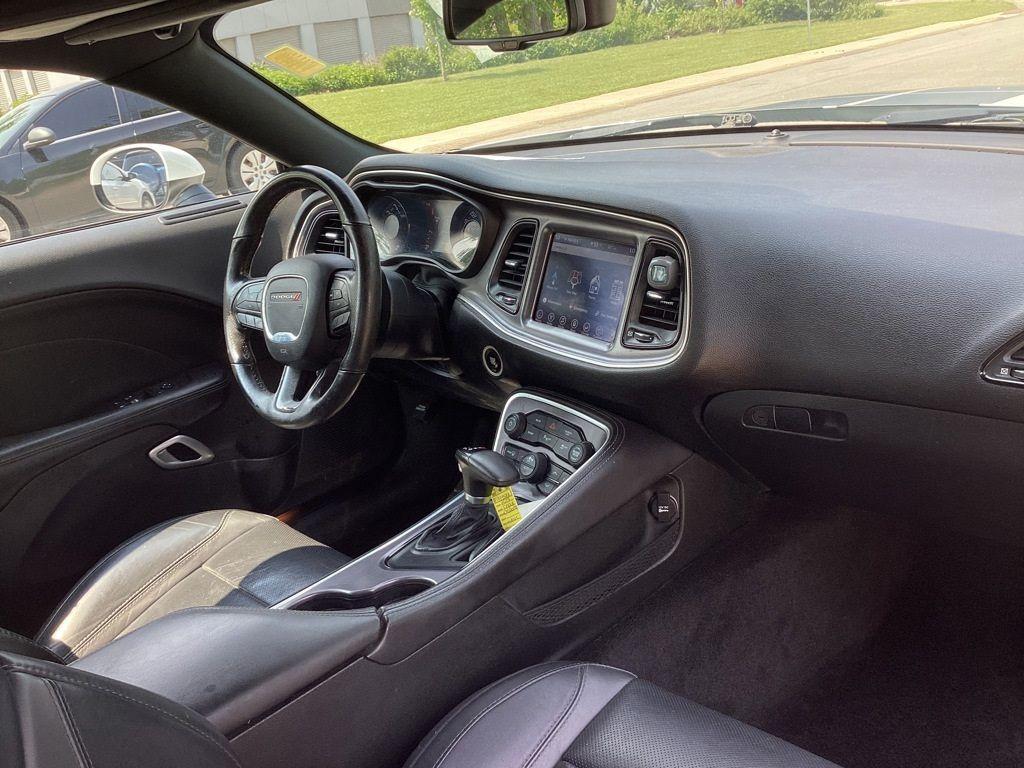 2017 /Black Dodge Challenger SXT (2C3CDZAG6HH) with an 3.6L V6 DOHC 24V engine, 8A transmission, located at 6064 Gull Rd, Kalamazoo, MI, 49048, (269) 222-0088, 42.328388, -85.512924 - <b>Summary</b><br>Power Moonroof<br><br><b>Vehicle Details</b><br>Experience the thrill of driving with this stunning 2017 Dodge Challenger SXT, a true embodiment of power and style. This remarkable vehicle features a robust V6, 3.6L engine paired with rear-wheel drive, offering an exhilarating yet - Photo#8