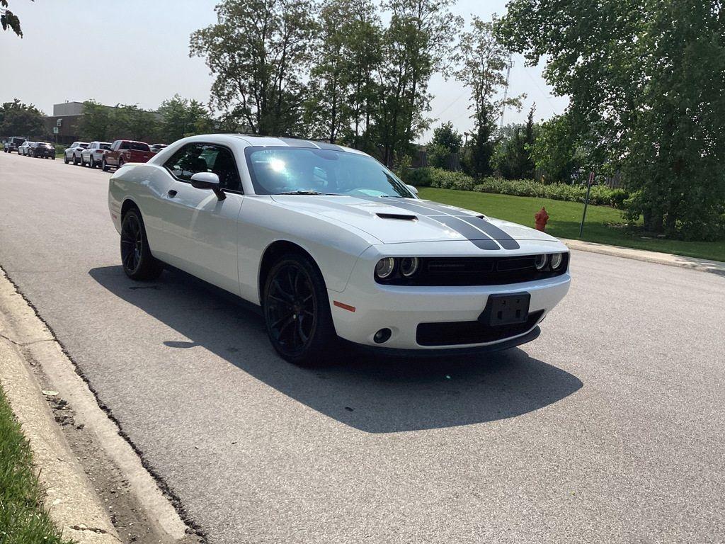 2017 /Black Dodge Challenger SXT (2C3CDZAG6HH) with an 3.6L V6 DOHC 24V engine, 8A transmission, located at 6064 Gull Rd, Kalamazoo, MI, 49048, (269) 222-0088, 42.328388, -85.512924 - <b>Summary</b><br>Power Moonroof<br><br><b>Vehicle Details</b><br>Experience the thrill of driving with this stunning 2017 Dodge Challenger SXT, a true embodiment of power and style. This remarkable vehicle features a robust V6, 3.6L engine paired with rear-wheel drive, offering an exhilarating yet - Photo#10