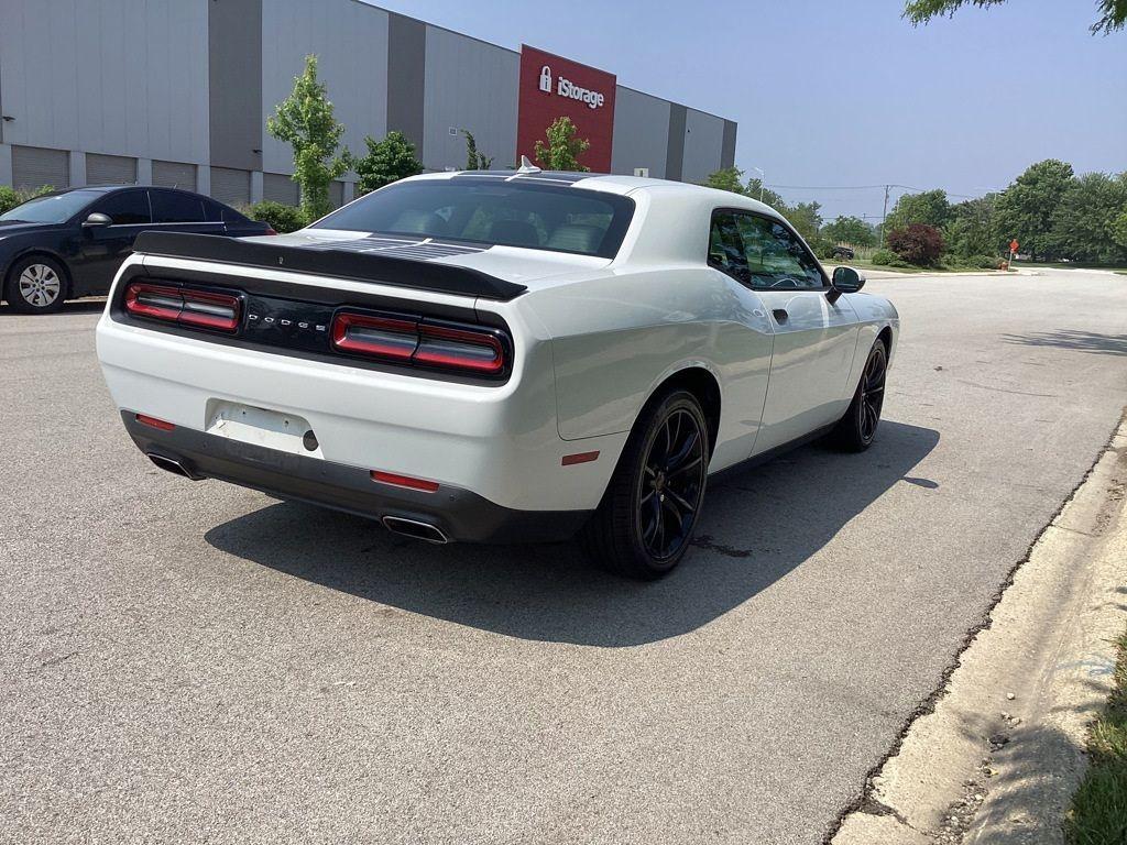 2017 /Black Dodge Challenger SXT (2C3CDZAG6HH) with an 3.6L V6 DOHC 24V engine, 8A transmission, located at 6064 Gull Rd, Kalamazoo, MI, 49048, (269) 222-0088, 42.328388, -85.512924 - <b>Summary</b><br>Power Moonroof<br><br><b>Vehicle Details</b><br>Experience the thrill of driving with this stunning 2017 Dodge Challenger SXT, a true embodiment of power and style. This remarkable vehicle features a robust V6, 3.6L engine paired with rear-wheel drive, offering an exhilarating yet - Photo#11