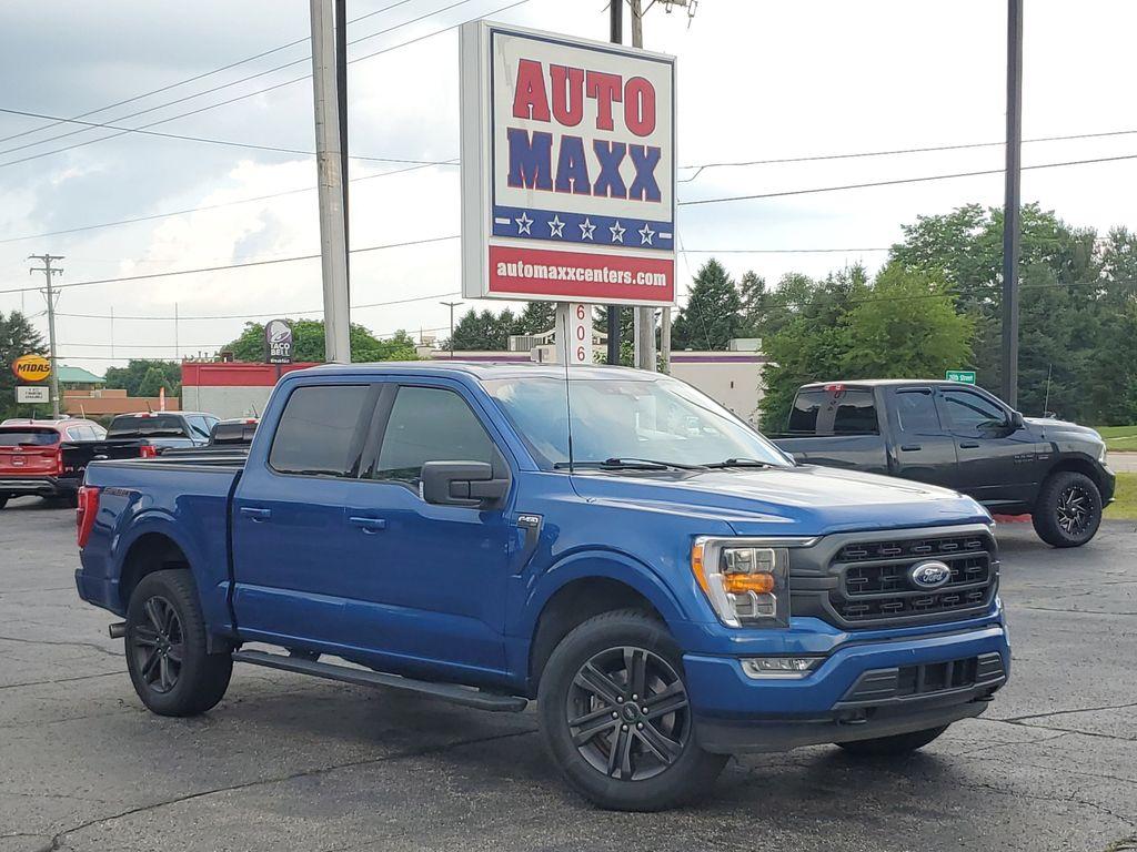 2022 BLUE /Black Ford F-150 XLT SuperCrew 6.5-ft. Bed 4WD (1FTEW1EP9NF) with an 2.7L V6 DOHC 24V engine, 6A transmission, located at 6064 Gull Rd, Kalamazoo, MI, 49048, (269) 222-0088, 42.328388, -85.512924 - <b>Vehicle Details</b><br>Discover the power, capability, and comfort of the 2022 Ford F-150 XLT, now available at our dealership. This exquisite truck, featuring a robust 4WD system and a powerful V6, 2.7L engine, is ready to tackle any terrain or task with ease. Whether you're hauling heavy loads - Photo#0