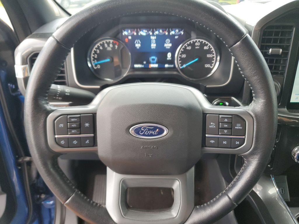 2022 BLUE /Black Ford F-150 XLT SuperCrew 6.5-ft. Bed 4WD (1FTEW1EP9NF) with an 2.7L V6 DOHC 24V engine, 6A transmission, located at 6064 Gull Rd, Kalamazoo, MI, 49048, (269) 222-0088, 42.328388, -85.512924 - <b>Vehicle Details</b><br>Discover the power, capability, and comfort of the 2022 Ford F-150 XLT, now available at our dealership. This exquisite truck, featuring a robust 4WD system and a powerful V6, 2.7L engine, is ready to tackle any terrain or task with ease. Whether you're hauling heavy loads - Photo#17