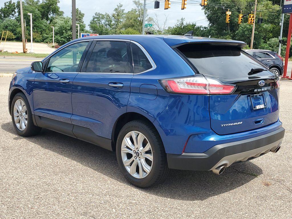 2022 Atlas Blue Metallic /Ebony Ford Edge Titanium AWD (2FMPK4K95NB) with an 2.0L L4 DOHC 16V engine, 6A transmission, located at 234 Columbia Ave, Battle Creek, MI, 49015, (269) 222-0088, 42.298264, -85.192543 - <b>Vehicle Details</b><br>Discover the exceptional blend of performance, technology, and comfort with this 2022 Ford Edge Titanium AWD. Equipped with a dynamic 4-cylinder, 2.0L engine, this SUV offers a smooth and responsive drive, making it perfect for both city commutes and weekend getaways. Stay - Photo#2
