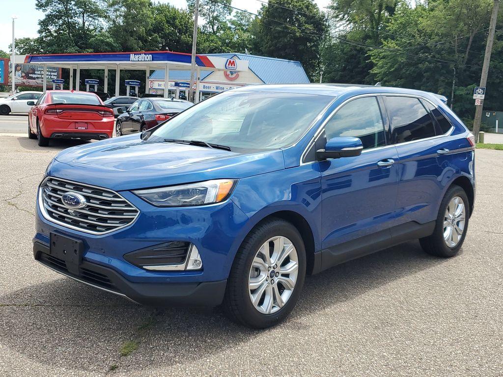 2022 Atlas Blue Metallic /Ebony Ford Edge Titanium AWD (2FMPK4K95NB) with an 2.0L L4 DOHC 16V engine, 6A transmission, located at 234 Columbia Ave, Battle Creek, MI, 49015, (269) 222-0088, 42.298264, -85.192543 - <b>Vehicle Details</b><br>Discover the exceptional blend of performance, technology, and comfort with this 2022 Ford Edge Titanium AWD. Equipped with a dynamic 4-cylinder, 2.0L engine, this SUV offers a smooth and responsive drive, making it perfect for both city commutes and weekend getaways. Stay - Photo#3