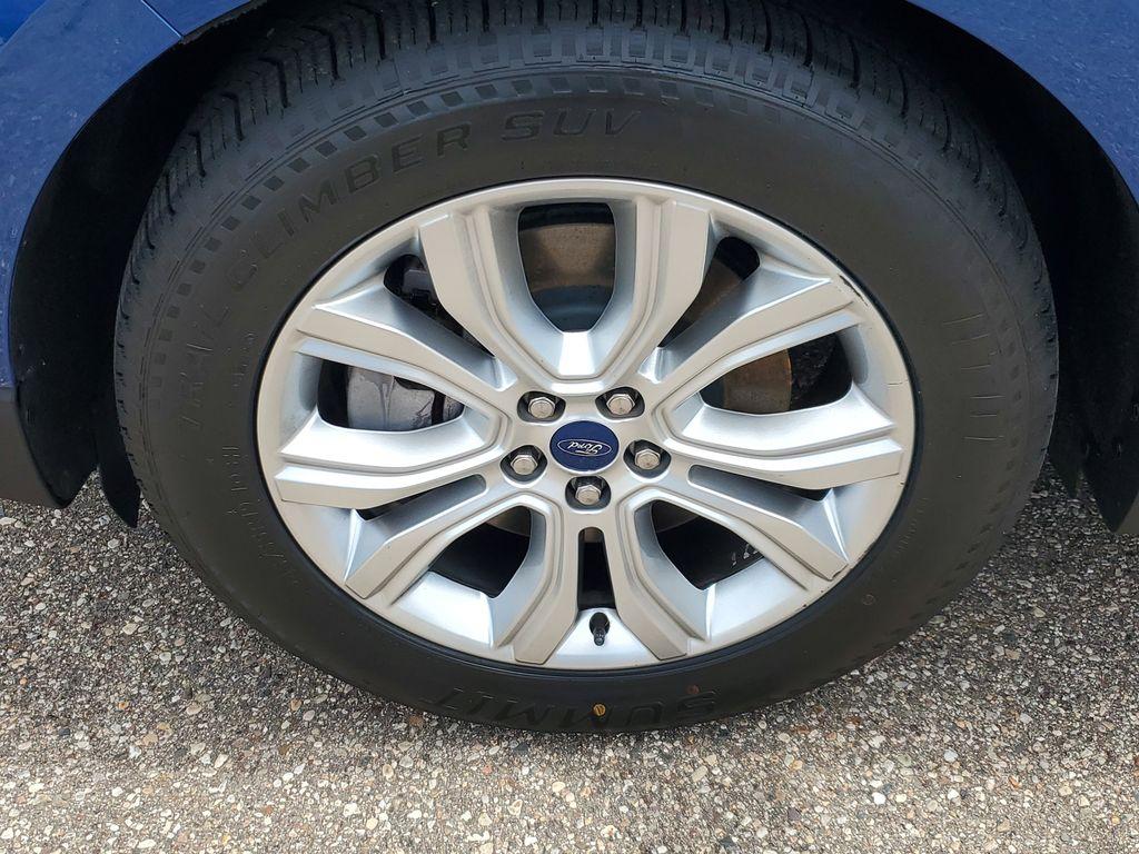 2022 Atlas Blue Metallic /Ebony Ford Edge Titanium AWD (2FMPK4K95NB) with an 2.0L L4 DOHC 16V engine, 6A transmission, located at 234 Columbia Ave, Battle Creek, MI, 49015, (269) 222-0088, 42.298264, -85.192543 - <b>Vehicle Details</b><br>Discover the exceptional blend of performance, technology, and comfort with this 2022 Ford Edge Titanium AWD. Equipped with a dynamic 4-cylinder, 2.0L engine, this SUV offers a smooth and responsive drive, making it perfect for both city commutes and weekend getaways. Stay - Photo#4