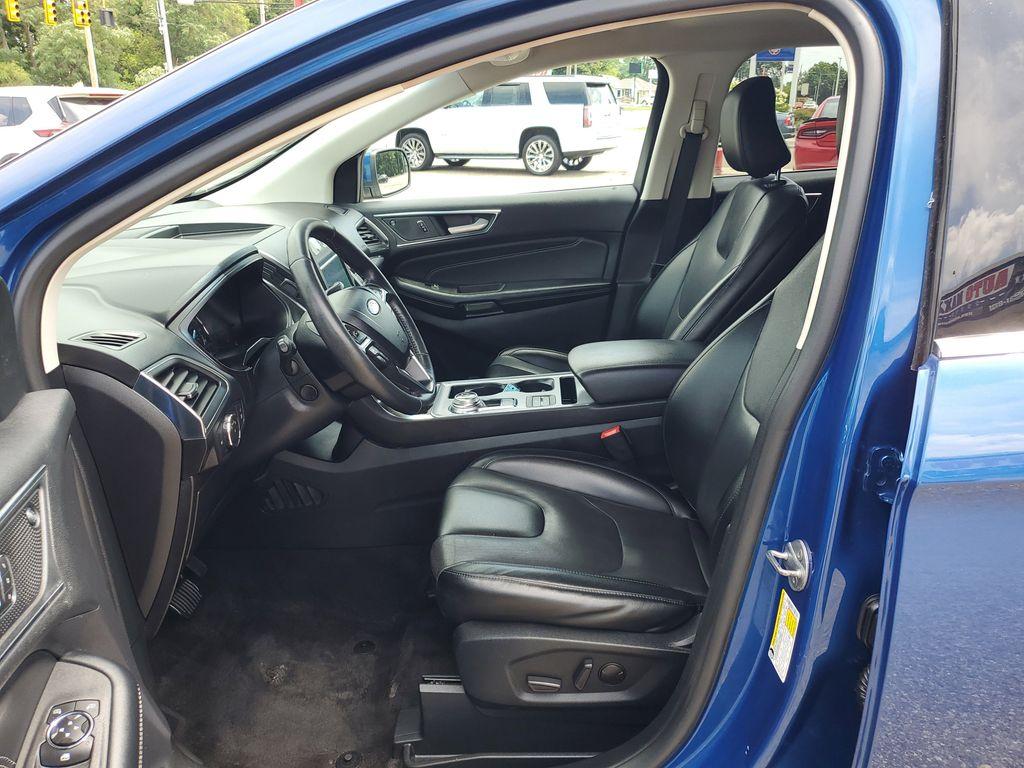 2022 Atlas Blue Metallic /Ebony Ford Edge Titanium AWD (2FMPK4K95NB) with an 2.0L L4 DOHC 16V engine, 6A transmission, located at 234 Columbia Ave, Battle Creek, MI, 49015, (269) 222-0088, 42.298264, -85.192543 - <b>Vehicle Details</b><br>Discover the exceptional blend of performance, technology, and comfort with this 2022 Ford Edge Titanium AWD. Equipped with a dynamic 4-cylinder, 2.0L engine, this SUV offers a smooth and responsive drive, making it perfect for both city commutes and weekend getaways. Stay - Photo#8