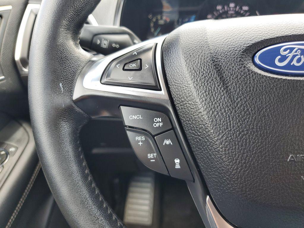 2022 Atlas Blue Metallic /Ebony Ford Edge Titanium AWD (2FMPK4K95NB) with an 2.0L L4 DOHC 16V engine, 6A transmission, located at 234 Columbia Ave, Battle Creek, MI, 49015, (269) 222-0088, 42.298264, -85.192543 - <b>Vehicle Details</b><br>Discover the exceptional blend of performance, technology, and comfort with this 2022 Ford Edge Titanium AWD. Equipped with a dynamic 4-cylinder, 2.0L engine, this SUV offers a smooth and responsive drive, making it perfect for both city commutes and weekend getaways. Stay - Photo#16