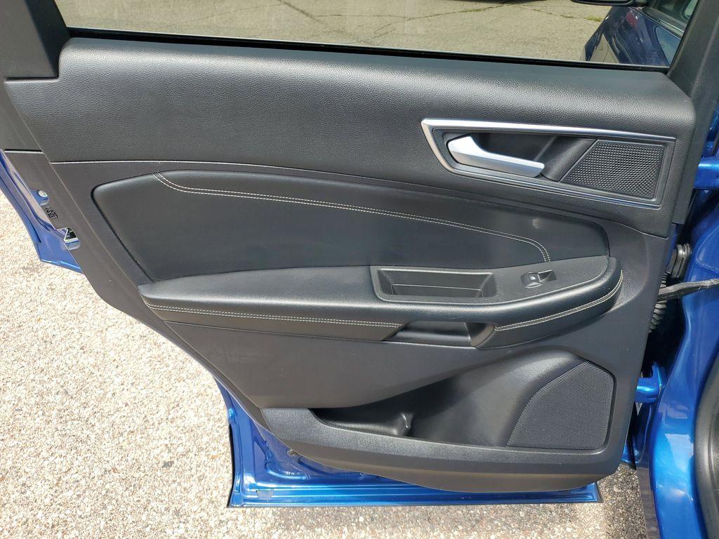 2022 Atlas Blue Metallic /Ebony Ford Edge Titanium AWD (2FMPK4K95NB) with an 2.0L L4 DOHC 16V engine, 6A transmission, located at 234 Columbia Ave, Battle Creek, MI, 49015, (269) 222-0088, 42.298264, -85.192543 - <b>Vehicle Details</b><br>Discover the exceptional blend of performance, technology, and comfort with this 2022 Ford Edge Titanium AWD. Equipped with a dynamic 4-cylinder, 2.0L engine, this SUV offers a smooth and responsive drive, making it perfect for both city commutes and weekend getaways. Stay - Photo#26