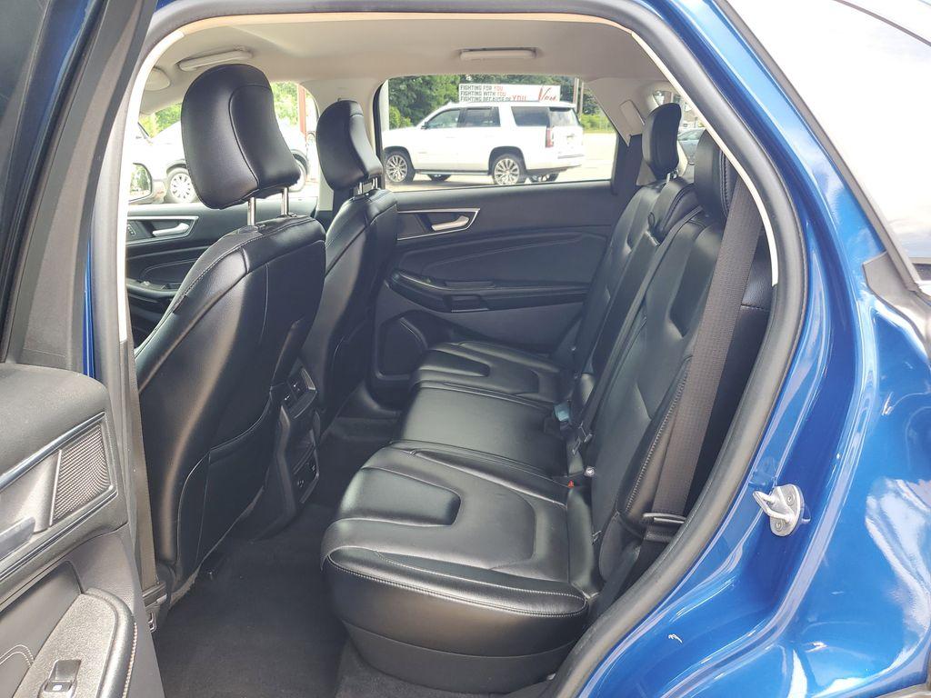 2022 Atlas Blue Metallic /Ebony Ford Edge Titanium AWD (2FMPK4K95NB) with an 2.0L L4 DOHC 16V engine, 6A transmission, located at 234 Columbia Ave, Battle Creek, MI, 49015, (269) 222-0088, 42.298264, -85.192543 - <b>Vehicle Details</b><br>Discover the exceptional blend of performance, technology, and comfort with this 2022 Ford Edge Titanium AWD. Equipped with a dynamic 4-cylinder, 2.0L engine, this SUV offers a smooth and responsive drive, making it perfect for both city commutes and weekend getaways. Stay - Photo#27