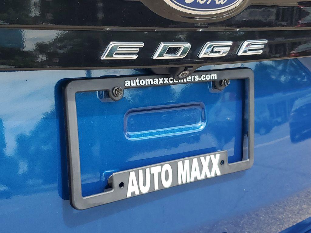 2022 Atlas Blue Metallic /Ebony Ford Edge Titanium AWD (2FMPK4K95NB) with an 2.0L L4 DOHC 16V engine, 6A transmission, located at 234 Columbia Ave, Battle Creek, MI, 49015, (269) 222-0088, 42.298264, -85.192543 - <b>Vehicle Details</b><br>Discover the exceptional blend of performance, technology, and comfort with this 2022 Ford Edge Titanium AWD. Equipped with a dynamic 4-cylinder, 2.0L engine, this SUV offers a smooth and responsive drive, making it perfect for both city commutes and weekend getaways. Stay - Photo#32