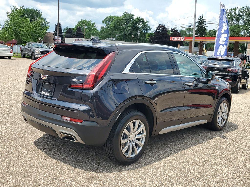 2023 Galactic Gray Metallic /Light Platinum/Jet Black Cadillac XT4 Premium Luxury AWD (1GYFZDR42PF) with an 2.0L L4 DOHC 16V engine, 9A transmission, located at 234 Columbia Ave, Battle Creek, MI, 49015, (269) 222-0088, 42.298264, -85.192543 - <b>Vehicle Details</b><br>Introducing the 2023 Cadillac XT4 AWD Premium Luxury, a sophisticated fusion of style, performance, and cutting-edge technology! This remarkable SUV is designed to elevate your driving experience with its sleek exterior and luxurious interior. Equipped with a robust 4-cylin - Photo#1
