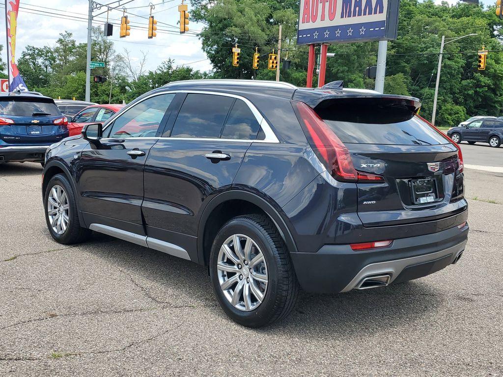 2023 Galactic Gray Metallic /Light Platinum/Jet Black Cadillac XT4 Premium Luxury AWD (1GYFZDR42PF) with an 2.0L L4 DOHC 16V engine, 9A transmission, located at 234 Columbia Ave, Battle Creek, MI, 49015, (269) 222-0088, 42.298264, -85.192543 - <b>Vehicle Details</b><br>Introducing the 2023 Cadillac XT4 AWD Premium Luxury, a sophisticated fusion of style, performance, and cutting-edge technology! This remarkable SUV is designed to elevate your driving experience with its sleek exterior and luxurious interior. Equipped with a robust 4-cylin - Photo#2