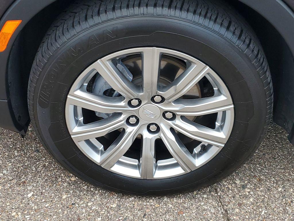 2023 Galactic Gray Metallic /Light Platinum/Jet Black Cadillac XT4 Premium Luxury AWD (1GYFZDR42PF) with an 2.0L L4 DOHC 16V engine, 9A transmission, located at 234 Columbia Ave, Battle Creek, MI, 49015, (269) 222-0088, 42.298264, -85.192543 - <b>Vehicle Details</b><br>Introducing the 2023 Cadillac XT4 AWD Premium Luxury, a sophisticated fusion of style, performance, and cutting-edge technology! This remarkable SUV is designed to elevate your driving experience with its sleek exterior and luxurious interior. Equipped with a robust 4-cylin - Photo#4