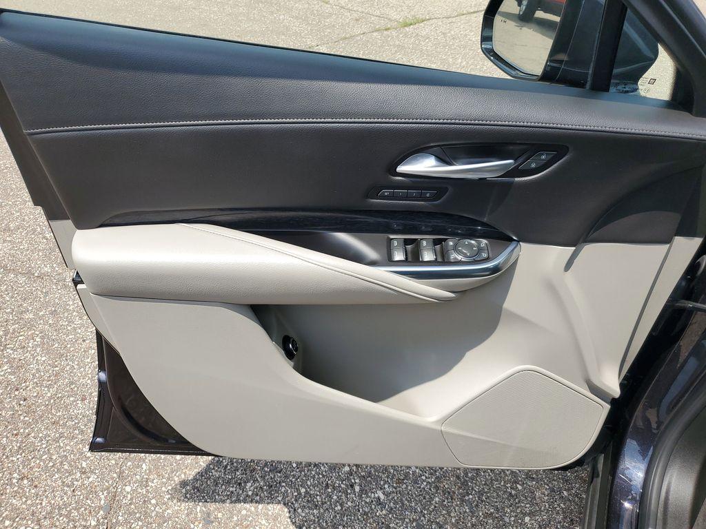 2023 Galactic Gray Metallic /Light Platinum/Jet Black Cadillac XT4 Premium Luxury AWD (1GYFZDR42PF) with an 2.0L L4 DOHC 16V engine, 9A transmission, located at 234 Columbia Ave, Battle Creek, MI, 49015, (269) 222-0088, 42.298264, -85.192543 - <b>Vehicle Details</b><br>Introducing the 2023 Cadillac XT4 AWD Premium Luxury, a sophisticated fusion of style, performance, and cutting-edge technology! This remarkable SUV is designed to elevate your driving experience with its sleek exterior and luxurious interior. Equipped with a robust 4-cylin - Photo#5