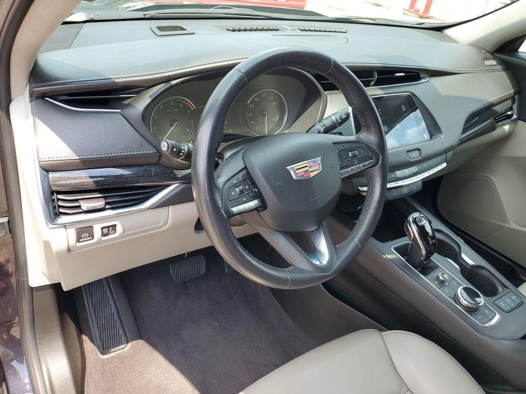 2023 Galactic Gray Metallic /Light Platinum/Jet Black Cadillac XT4 Premium Luxury AWD (1GYFZDR42PF) with an 2.0L L4 DOHC 16V engine, 9A transmission, located at 234 Columbia Ave, Battle Creek, MI, 49015, (269) 222-0088, 42.298264, -85.192543 - <b>Vehicle Details</b><br>Introducing the 2023 Cadillac XT4 AWD Premium Luxury, a sophisticated fusion of style, performance, and cutting-edge technology! This remarkable SUV is designed to elevate your driving experience with its sleek exterior and luxurious interior. Equipped with a robust 4-cylin - Photo#11