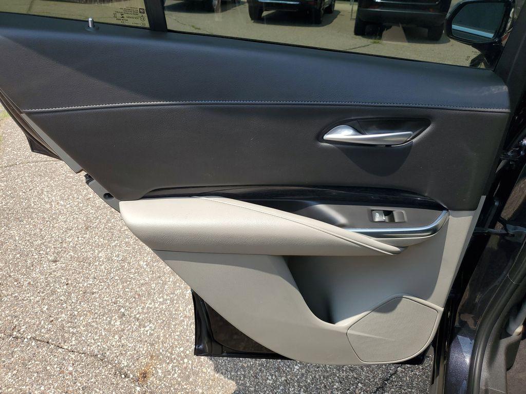 2023 Galactic Gray Metallic /Light Platinum/Jet Black Cadillac XT4 Premium Luxury AWD (1GYFZDR42PF) with an 2.0L L4 DOHC 16V engine, 9A transmission, located at 234 Columbia Ave, Battle Creek, MI, 49015, (269) 222-0088, 42.298264, -85.192543 - <b>Vehicle Details</b><br>Introducing the 2023 Cadillac XT4 AWD Premium Luxury, a sophisticated fusion of style, performance, and cutting-edge technology! This remarkable SUV is designed to elevate your driving experience with its sleek exterior and luxurious interior. Equipped with a robust 4-cylin - Photo#26