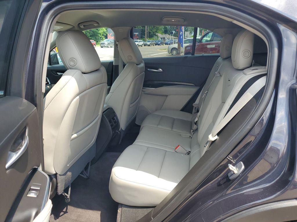 2023 Galactic Gray Metallic /Light Platinum/Jet Black Cadillac XT4 Premium Luxury AWD (1GYFZDR42PF) with an 2.0L L4 DOHC 16V engine, 9A transmission, located at 234 Columbia Ave, Battle Creek, MI, 49015, (269) 222-0088, 42.298264, -85.192543 - <b>Vehicle Details</b><br>Introducing the 2023 Cadillac XT4 AWD Premium Luxury, a sophisticated fusion of style, performance, and cutting-edge technology! This remarkable SUV is designed to elevate your driving experience with its sleek exterior and luxurious interior. Equipped with a robust 4-cylin - Photo#27