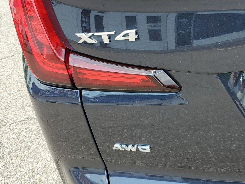 2023 Galactic Gray Metallic /Light Platinum/Jet Black Cadillac XT4 Premium Luxury AWD (1GYFZDR42PF) with an 2.0L L4 DOHC 16V engine, 9A transmission, located at 234 Columbia Ave, Battle Creek, MI, 49015, (269) 222-0088, 42.298264, -85.192543 - <b>Vehicle Details</b><br>Introducing the 2023 Cadillac XT4 AWD Premium Luxury, a sophisticated fusion of style, performance, and cutting-edge technology! This remarkable SUV is designed to elevate your driving experience with its sleek exterior and luxurious interior. Equipped with a robust 4-cylin - Photo#32