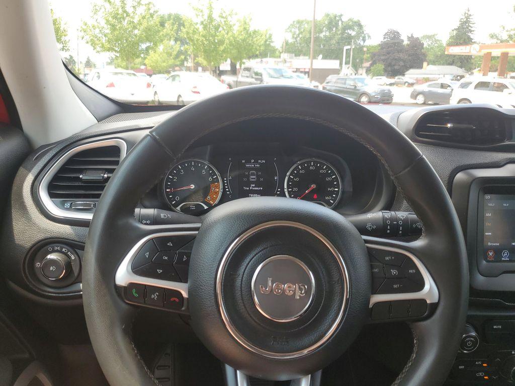 2020 Colorado Red Clearcoat /Black Jeep Renegade Latitude 4WD (ZACNJBBB4LP) with an 2.4L L4 DOHC 16V engine, 9A transmission, located at 234 Columbia Ave, Battle Creek, MI, 49015, (269) 222-0088, 42.298264, -85.192543 - <b>Vehicle Details</b><br>Get ready to conquer the roads with this stunning 2020 Jeep Renegade Latitude! This adventure-ready SUV is the perfect blend of rugged capability and modern sophistication. With its robust 4WD system, you'll easily tackle any terrain, whether you're navigating city streets - Photo#8