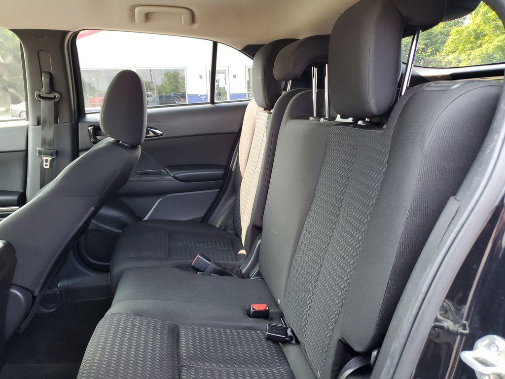 2020 Tarmac Black Metallic /BLACK Mitsubishi Eclipse Cross ES (JA4AS3AA8LZ) with an 1.5L L4 DOHC 16V engine, CVT transmission, located at 6064 Gull Rd, Kalamazoo, MI, 49048, (269) 222-0088, 42.328388, -85.512924 - Discover the refined blend of style, efficiency, and innovation with the 2020 Mitsubishi Eclipse Cross ES. This compact SUV is designed for those who value performance and practicality. Powered by a spirited 1.5L 4-cylinder engine, the Mitsubishi Eclipse Cross ES offers a smooth and responsive drivi - Photo#7