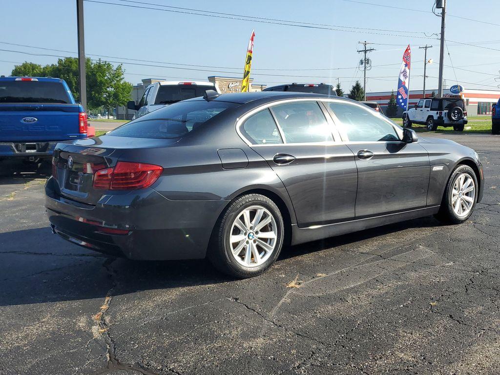 2016 Space Gray Metallic /BLACK BMW 5-Series 528i (WBA5A5C55GG) with an 2.0L L4 DOHC 16V TURBO engine, 8A transmission, located at 6064 Gull Rd, Kalamazoo, MI, 49048, (269) 222-0088, 42.328388, -85.512924 - <b>Vehicle Details</b><br>Introducing the 2016 BMW 5 Series 528i, a sophisticated blend of performance and luxury. This rear-wheel-drive sedan is powered by a dynamic 4-cylinder, 2.0-liter engine, delivering an engaging driving experience synonymous with the BMW brand. Its sleek design is complement - Photo#3