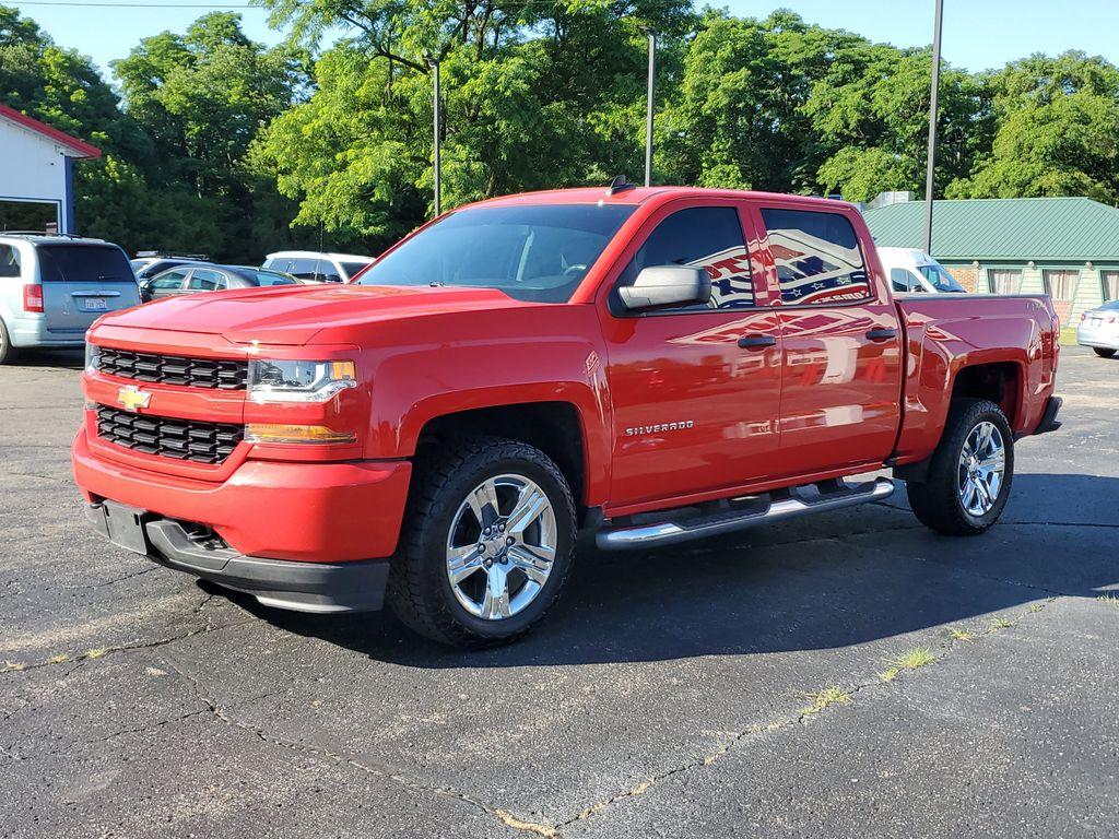 2018 Red Hot /Dark Ash/Jet Black Chevrolet Silverado 1500 Custom Crew Cab 4WD (3GCUKPEC8JG) with an 5.3L V8 OHV 16V engine, 6A transmission, located at 6064 Gull Rd, Kalamazoo, MI, 49048, (269) 222-0088, 42.328388, -85.512924 - For sale: A 2018 Chevrolet Silverado 1500 Custom that perfectly combines power, versatility, and style. This robust truck is equipped with a V8, 5.3L engine, delivering the performance and reliability you need for both work and leisure. Whether you're towing heavy loads or navigating rugged terrain, - Photo#1