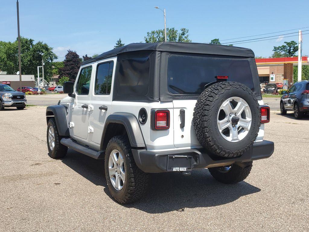 2018 Bright White Clearcoat /Black Jeep Wrangler JK Unlimited Sport (1C4HJXDG9JW) with an 3.6L V6 DOHC 24V FFV engine, 6A transmission, located at 234 Columbia Ave, Battle Creek, MI, 49015, (269) 222-0088, 42.298264, -85.192543 - <b>Vehicle Details</b><br>Unleash your adventurous spirit with this stunning 2018 Jeep Wrangler Sport S! Engineered for excitement and built to conquer any terrain, this dynamic 4WD powerhouse is equipped with a robust V6, 3.6L engine that delivers exceptional performance and reliability. Whether yo - Photo#2