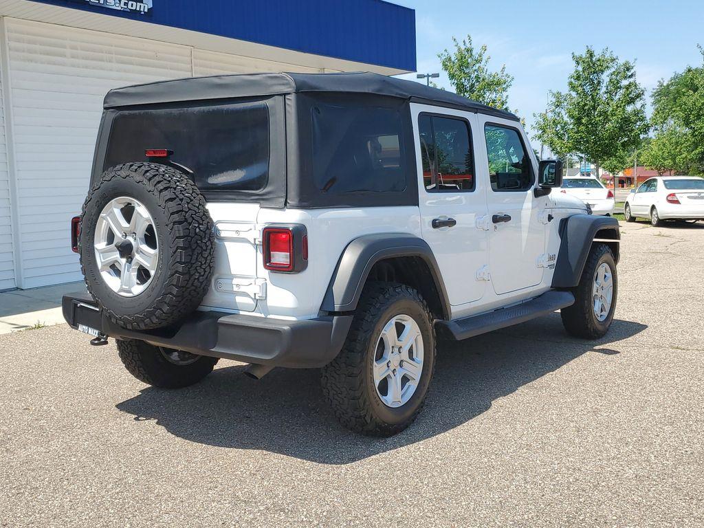 2018 Bright White Clearcoat /Black Jeep Wrangler JK Unlimited Sport (1C4HJXDG9JW) with an 3.6L V6 DOHC 24V FFV engine, 6A transmission, located at 234 Columbia Ave, Battle Creek, MI, 49015, (269) 222-0088, 42.298264, -85.192543 - <b>Vehicle Details</b><br>Unleash your adventurous spirit with this stunning 2018 Jeep Wrangler Sport S! Engineered for excitement and built to conquer any terrain, this dynamic 4WD powerhouse is equipped with a robust V6, 3.6L engine that delivers exceptional performance and reliability. Whether yo - Photo#3