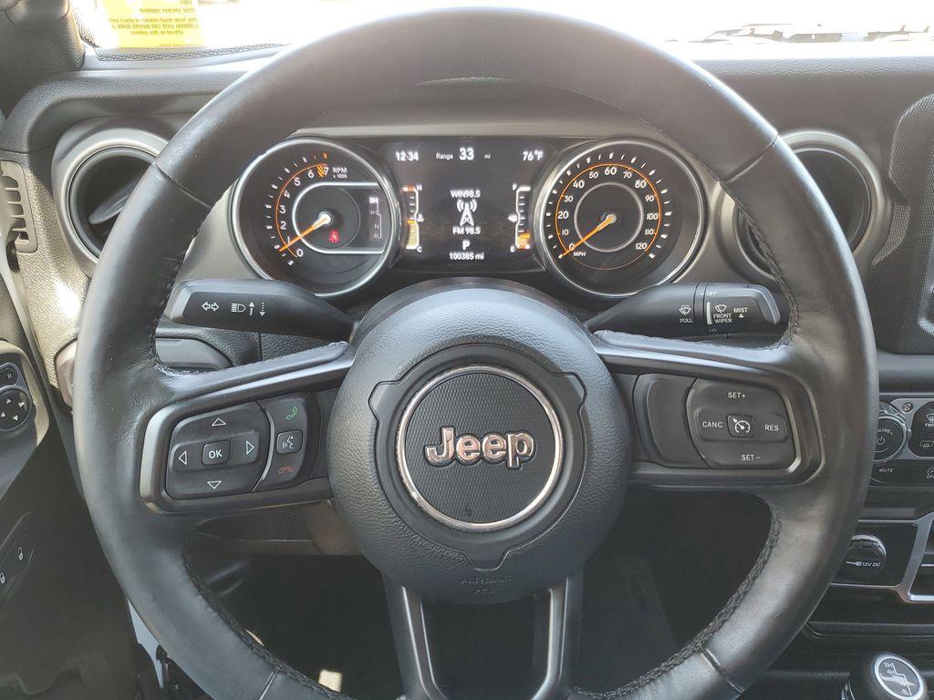 2018 Bright White Clearcoat /Black Jeep Wrangler JK Unlimited Sport (1C4HJXDG9JW) with an 3.6L V6 DOHC 24V FFV engine, 6A transmission, located at 234 Columbia Ave, Battle Creek, MI, 49015, (269) 222-0088, 42.298264, -85.192543 - <b>Vehicle Details</b><br>Unleash your adventurous spirit with this stunning 2018 Jeep Wrangler Sport S! Engineered for excitement and built to conquer any terrain, this dynamic 4WD powerhouse is equipped with a robust V6, 3.6L engine that delivers exceptional performance and reliability. Whether yo - Photo#9