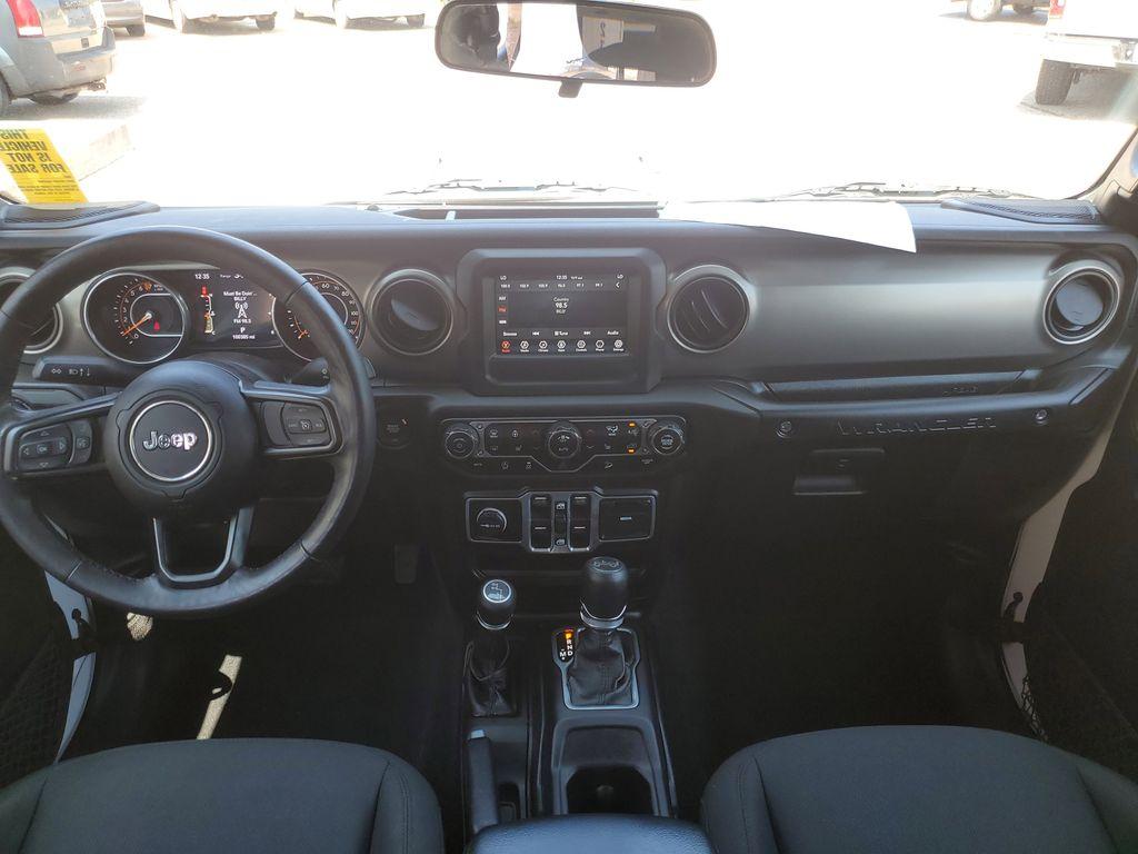 2018 Bright White Clearcoat /Black Jeep Wrangler JK Unlimited Sport (1C4HJXDG9JW) with an 3.6L V6 DOHC 24V FFV engine, 6A transmission, located at 234 Columbia Ave, Battle Creek, MI, 49015, (269) 222-0088, 42.298264, -85.192543 - <b>Vehicle Details</b><br>Unleash your adventurous spirit with this stunning 2018 Jeep Wrangler Sport S! Engineered for excitement and built to conquer any terrain, this dynamic 4WD powerhouse is equipped with a robust V6, 3.6L engine that delivers exceptional performance and reliability. Whether yo - Photo#22