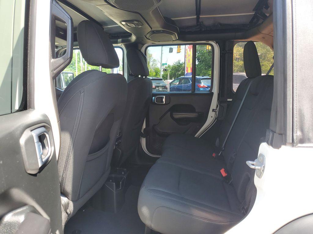 2018 Bright White Clearcoat /Black Jeep Wrangler JK Unlimited Sport (1C4HJXDG9JW) with an 3.6L V6 DOHC 24V FFV engine, 6A transmission, located at 234 Columbia Ave, Battle Creek, MI, 49015, (269) 222-0088, 42.298264, -85.192543 - <b>Vehicle Details</b><br>Unleash your adventurous spirit with this stunning 2018 Jeep Wrangler Sport S! Engineered for excitement and built to conquer any terrain, this dynamic 4WD powerhouse is equipped with a robust V6, 3.6L engine that delivers exceptional performance and reliability. Whether yo - Photo#24
