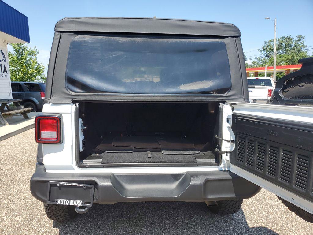 2018 Bright White Clearcoat /Black Jeep Wrangler JK Unlimited Sport (1C4HJXDG9JW) with an 3.6L V6 DOHC 24V FFV engine, 6A transmission, located at 234 Columbia Ave, Battle Creek, MI, 49015, (269) 222-0088, 42.298264, -85.192543 - <b>Vehicle Details</b><br>Unleash your adventurous spirit with this stunning 2018 Jeep Wrangler Sport S! Engineered for excitement and built to conquer any terrain, this dynamic 4WD powerhouse is equipped with a robust V6, 3.6L engine that delivers exceptional performance and reliability. Whether yo - Photo#25