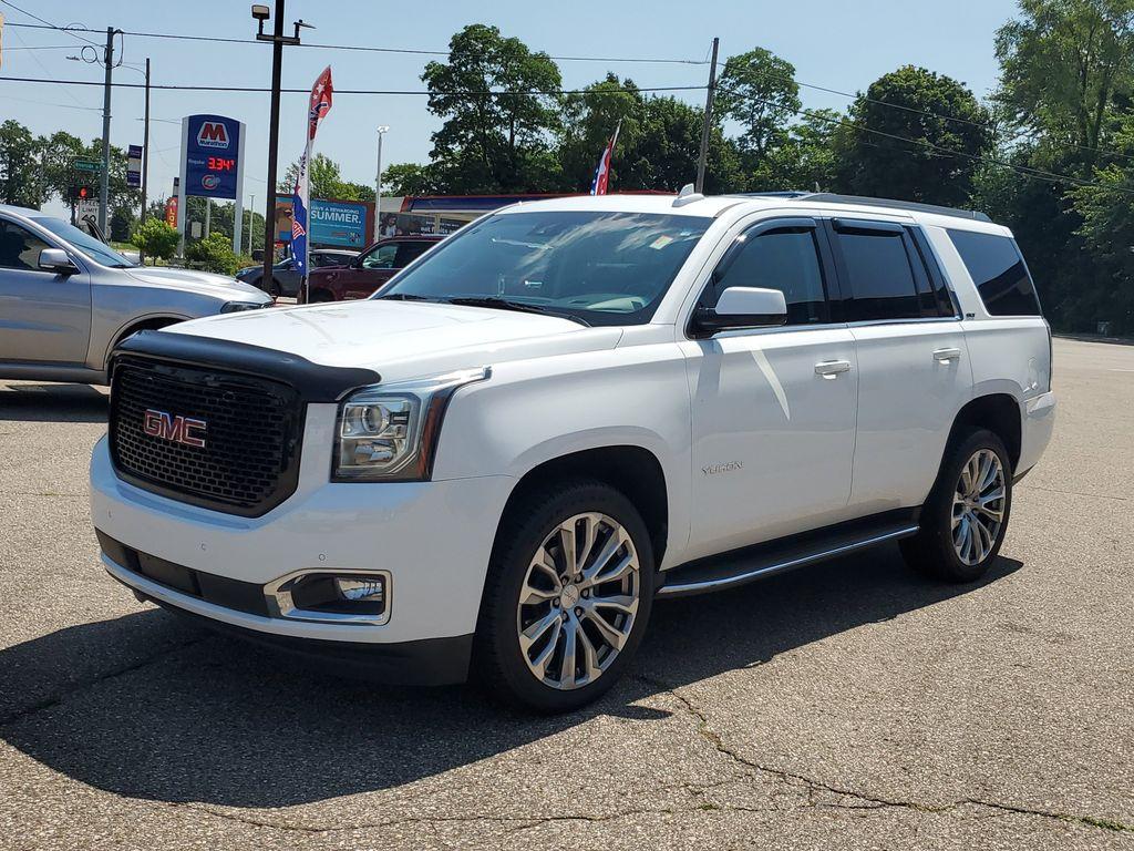 2019 Summit White /Jet Black GMC Yukon SLT 4WD (1GKS2BKC2KR) with an 5.3L V8 OHV 16V FFV engine, 6A transmission, located at 234 Columbia Ave, Battle Creek, MI, 49015, (269) 222-0088, 42.298264, -85.192543 - <b>Vehicle Details</b><br>Introducing the 2019 GMC Yukon 1500 SLT, a robust and sophisticated SUV designed to elevate your driving experience. This well-maintained, pre-owned vehicle combines power and luxury, offering a 4WD system that ensures confident handling in diverse driving conditions. At th - Photo#3