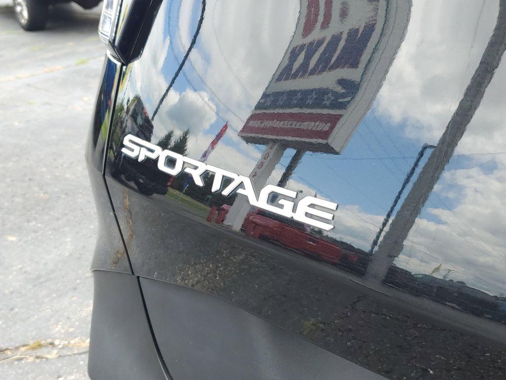 2024 Fusion Black /BLACK Kia Sportage LX AWD (KNDPUCDFXR7) with an 2.5L V6 DOHC 24V engine, 8A transmission, located at 6064 Gull Rd, Kalamazoo, MI, 49048, (269) 222-0088, 42.328388, -85.512924 - Discover the perfect blend of style, performance, and technology with this pre-owned 2024 Kia Sportage LX featuring AWD. This versatile SUV is equipped with a robust 4-cylinder, 2.5L engine, ensuring a dynamic driving experience coupled with impressive fuel efficiency. The Kia Sportage LX is designe - Photo#5