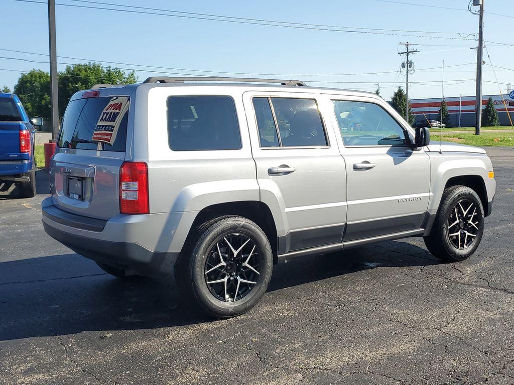 2015 Billet Silver Metallic Clearcoat /Dark Slate Gray Jeep Patriot Sport 4WD (1C4NJRBB4FD) with an 2.4L L4 DOHC 16V engine, 6-speed automatic transmission, located at 6064 Gull Rd, Kalamazoo, MI, 49048, (269) 222-0088, 42.328388, -85.512924 - Discover the reliability and rugged capability of the 2015 Jeep Patriot Sport, a compact SUV designed to tackle both urban and off-road adventures with ease. Equipped with a robust 4WD system, this vehicle ensures confident handling in diverse road conditions, making it an ideal choice for those who - Photo#3