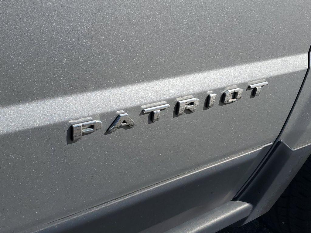2015 Billet Silver Metallic Clearcoat /Dark Slate Gray Jeep Patriot Sport 4WD (1C4NJRBB4FD) with an 2.4L L4 DOHC 16V engine, 6-speed automatic transmission, located at 6064 Gull Rd, Kalamazoo, MI, 49048, (269) 222-0088, 42.328388, -85.512924 - Discover the reliability and rugged capability of the 2015 Jeep Patriot Sport, a compact SUV designed to tackle both urban and off-road adventures with ease. Equipped with a robust 4WD system, this vehicle ensures confident handling in diverse road conditions, making it an ideal choice for those who - Photo#5